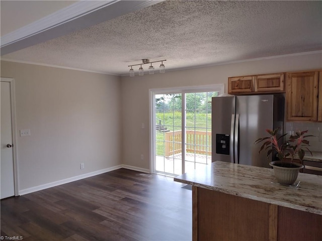 251 Marshall Farm Rd, Mount Airy, NC 27030 - kitchen with stainless steel fridge, dark wood-type flooring, crown molding, light stone countertops, and a textured ceiling