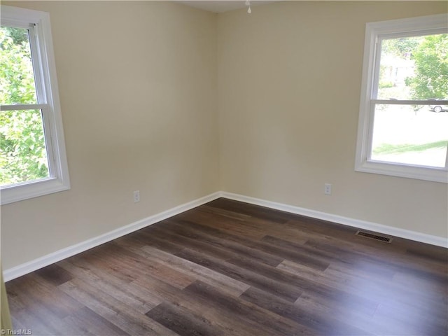 251 Marshall Farm Rd, Mount Airy, NC 27030 - unfurnished room with healthy amount of natural light and dark wood-type flooring