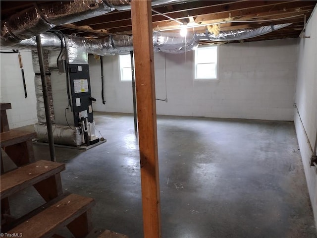 251 Marshall Farm Rd, Mount Airy, NC 27030 - basement featuring plenty of natural light, heating unit, and concrete block wall