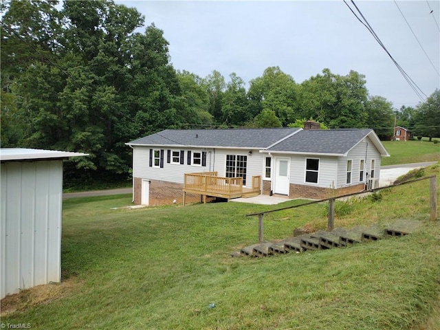251 Marshall Farm Rd, Mount Airy, NC 27030 - back of property with a deck, a lawn, a chimney, and roof with shingles