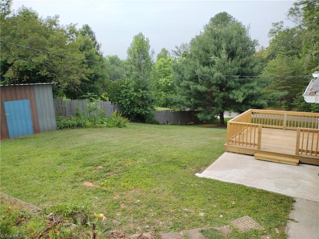 251 Marshall Farm Rd, Mount Airy, NC 27030 - fenced backyard featuring a storage unit and a wooden deck