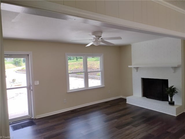 251 Marshall Farm Rd, Mount Airy, NC 27030 - unfurnished living room featuring dark wood-style flooring, a ceiling fan, and a fireplace