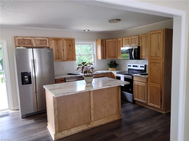 251 Marshall Farm Rd, Mount Airy, NC 27030 - kitchen featuring stainless steel appliances, light countertops, dark wood-style floors, a center island, and crown molding