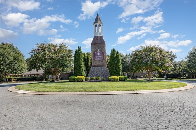 surrounding community with a yard