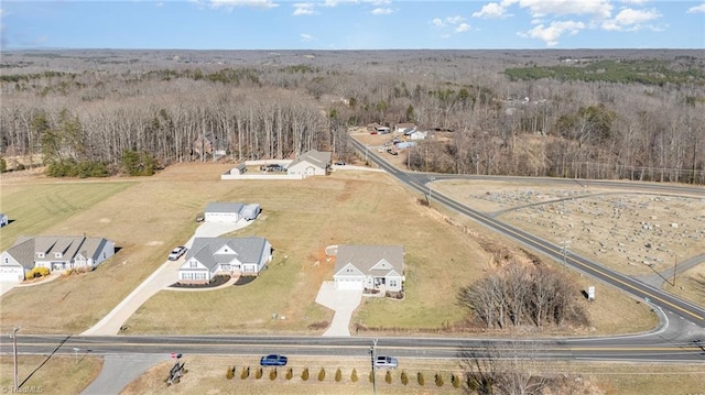 aerial view featuring a forest view