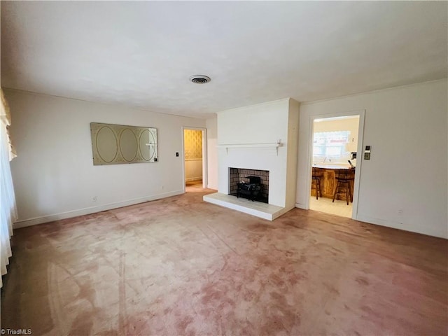 unfurnished living room with carpet