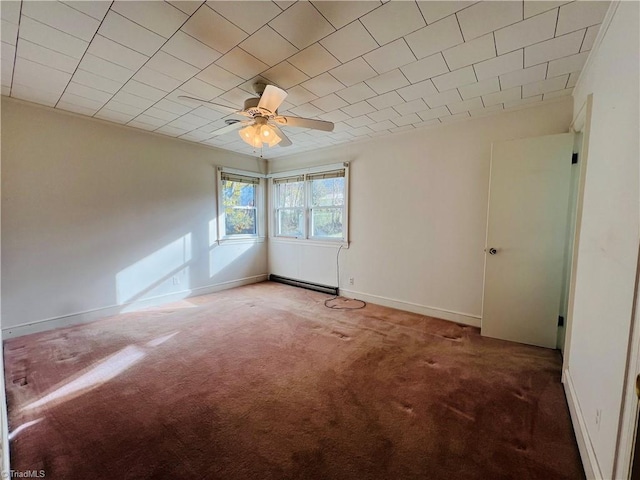 unfurnished room featuring a baseboard radiator, ceiling fan, and carpet flooring