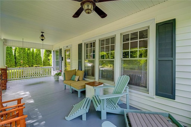 view of patio / terrace with a porch and a ceiling fan