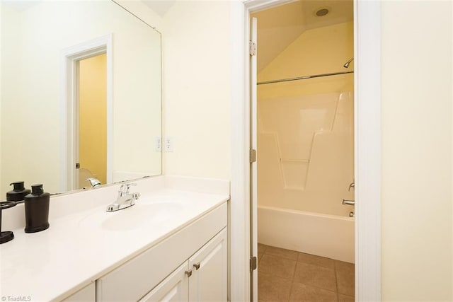 full bath featuring bathtub / shower combination, vanity, and tile patterned floors