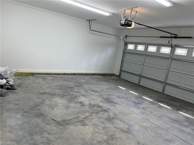 garage featuring a garage door opener