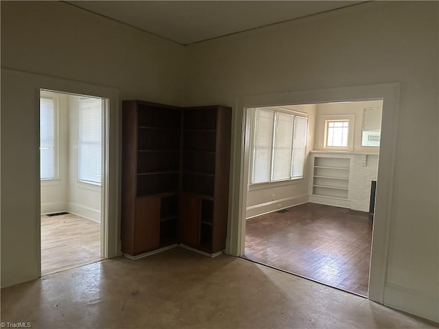 1712 E First St, Winston-Salem, NC 27101 - unfurnished living room with baseboards