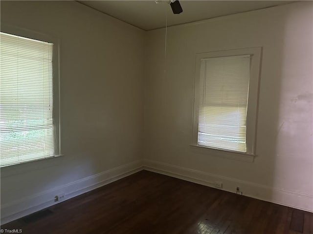 1712 E First St, Winston-Salem, NC 27101 - spare room featuring dark wood-type flooring and a ceiling fan