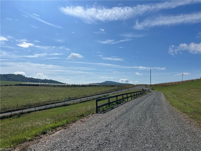 view of road featuring a mountain view and a rural view