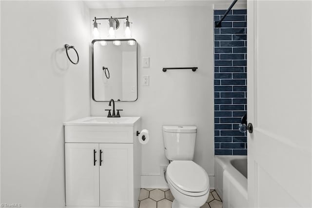 full bathroom with toilet, vanity, tile patterned floors, and washtub / shower combination