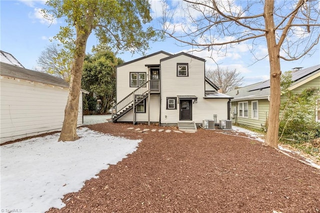 view of front of home featuring central AC unit