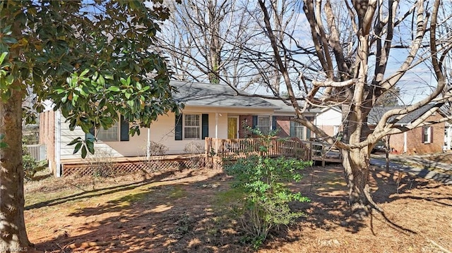 ranch-style house featuring brick siding and a porch