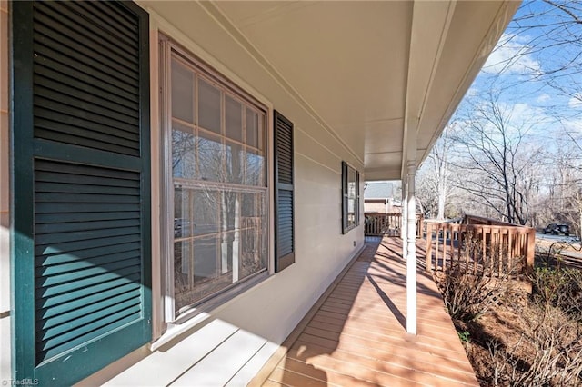 wooden deck featuring covered porch