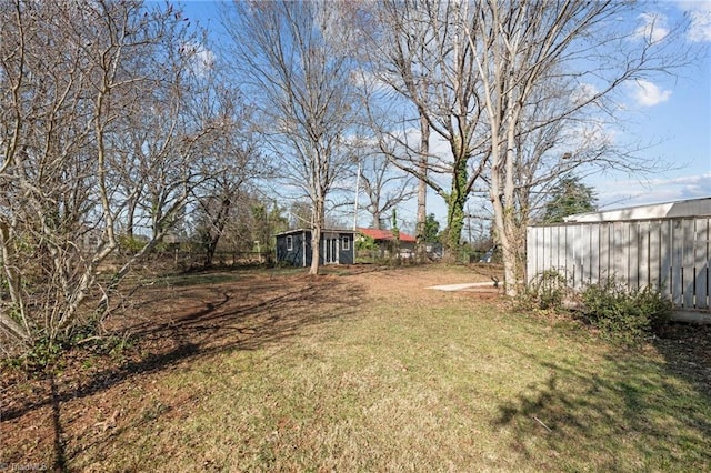 view of yard with an outdoor structure