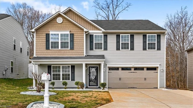 view of front facade featuring board and batten siding, an attached garage, driveway, and a front lawn