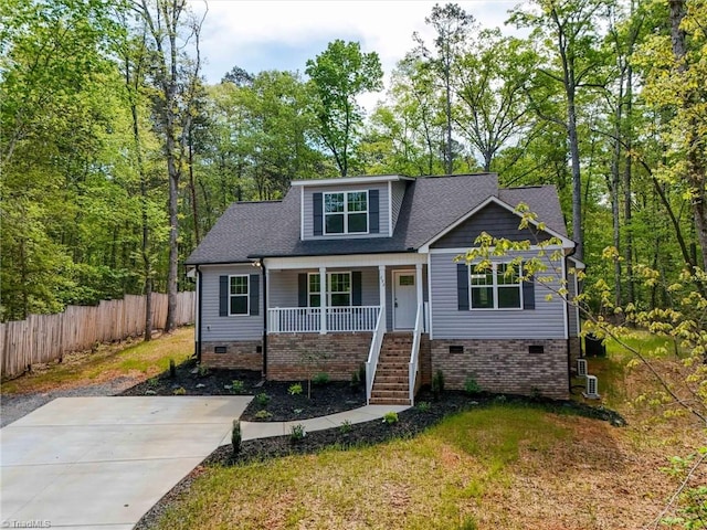 view of front of property featuring covered porch