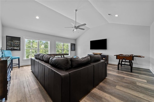 7604 Pemberley Dr, Oak Ridge, NC 27310 - living room with a ceiling fan, vaulted ceiling, wood finished floors, and recessed lighting