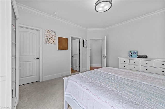 7604 Pemberley Dr, Oak Ridge, NC 27310 - carpeted bedroom featuring crown molding and baseboards