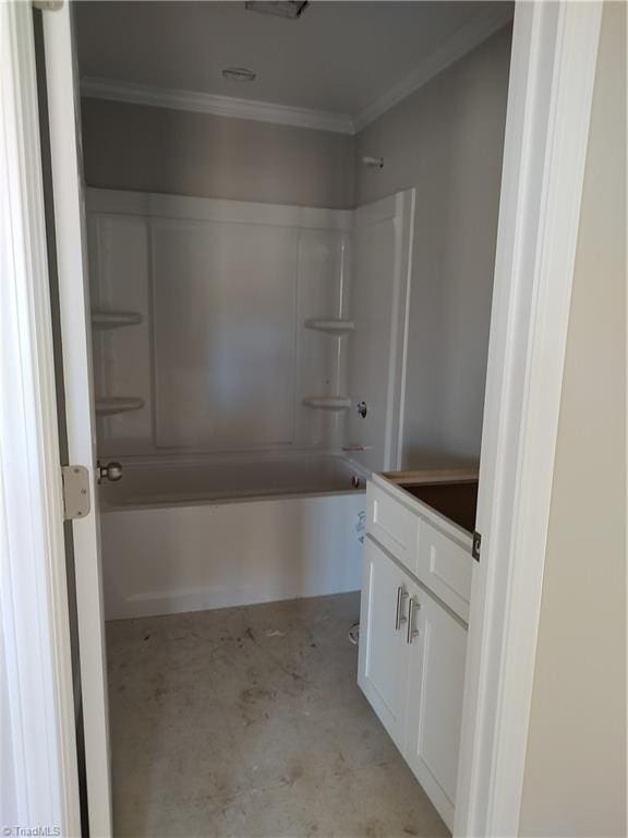 bathroom with concrete floors, shower / bath combination, and ornamental molding