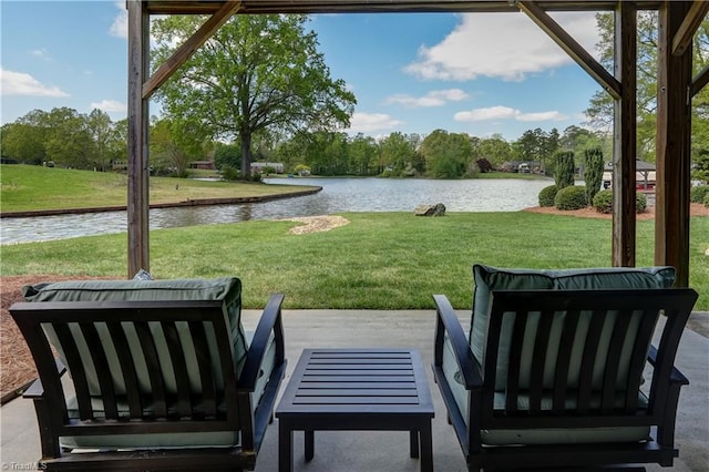 exterior space featuring an outdoor hangout area and a water view
