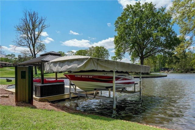 dock area featuring a water view and boat lift