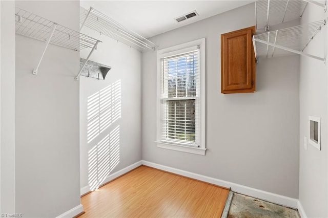 washroom featuring light hardwood / wood-style floors