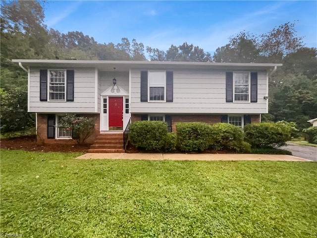 bi-level home with a front yard