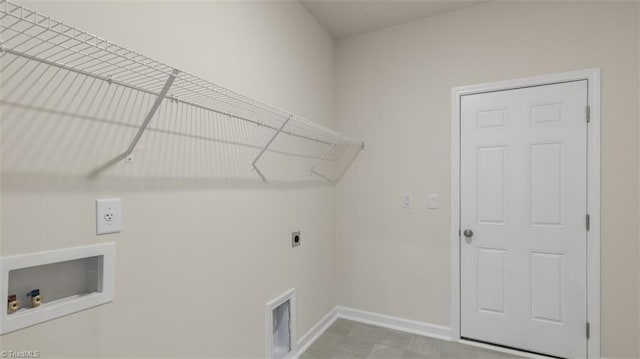 laundry area with washer hookup and hookup for an electric dryer