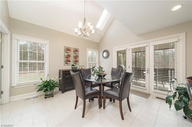dining room with a chandelier, plenty of natural light, baseboards, recessed lighting, and high vaulted ceiling