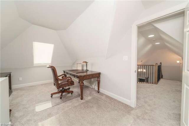 carpeted office featuring vaulted ceiling, baseboards, and recessed lighting