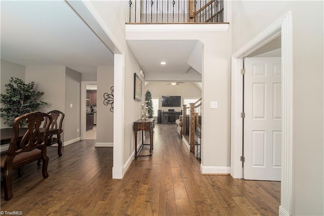 entryway with hardwood / wood-style flooring, baseboards, ceiling fan, and recessed lighting