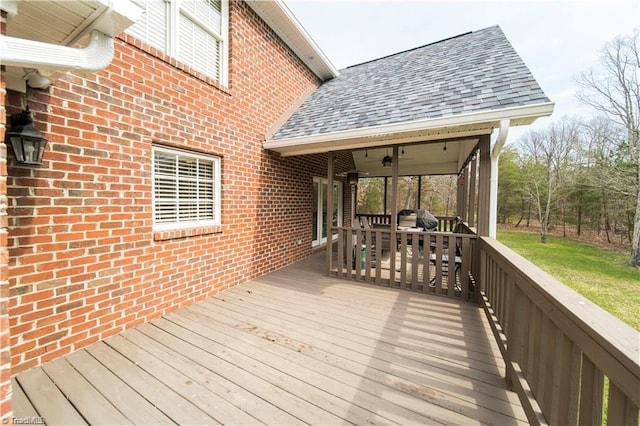 wooden deck with ceiling fan