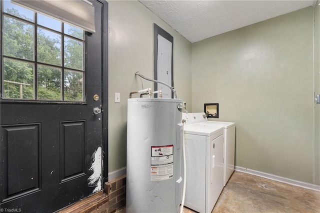 267 Pine Ridge Trl, Pinnacle, NC 27043 - washroom with water heater, washing machine and dryer, and a textured ceiling