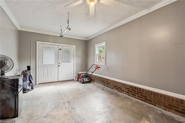 267 Pine Ridge Trl, Pinnacle, NC 27043 - entryway featuring concrete flooring, a textured ceiling, french doors, crown molding, and ceiling fan