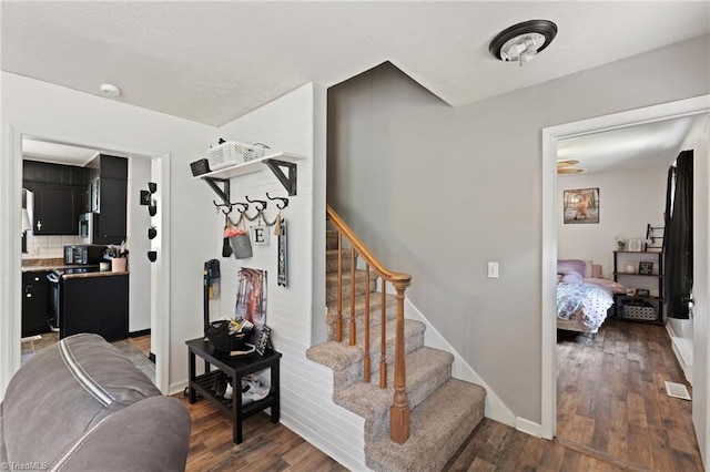 267 Pine Ridge Trl, Pinnacle, NC 27043 - stairway with wood finished floors and baseboards