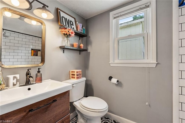 267 Pine Ridge Trl, Pinnacle, NC 27043 - bathroom featuring vanity and a textured ceiling