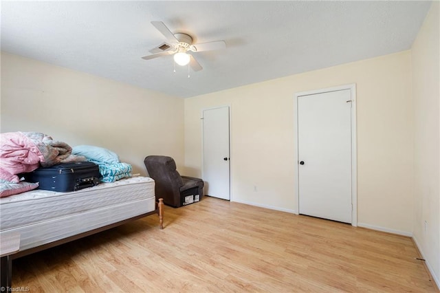 267 Pine Ridge Trl, Pinnacle, NC 27043 - bedroom featuring light wood-style floors and a ceiling fan