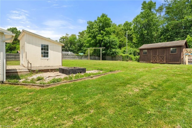 267 Pine Ridge Trl, Pinnacle, NC 27043 - fenced backyard featuring a storage unit