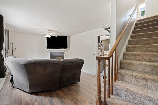 267 Pine Ridge Trl, Pinnacle, NC 27043 - living room with ceiling fan, stairway, wood finished floors, and a fireplace