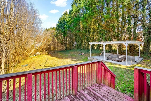 wooden deck with a pergola and a yard