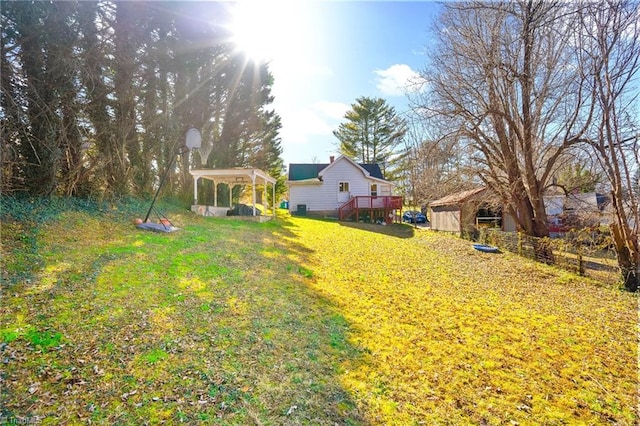 view of yard featuring a wooden deck