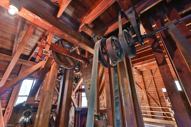 miscellaneous room featuring vaulted ceiling with beams and wood ceiling