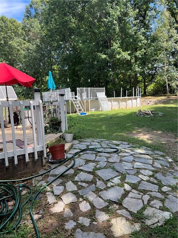 view of patio featuring a playground