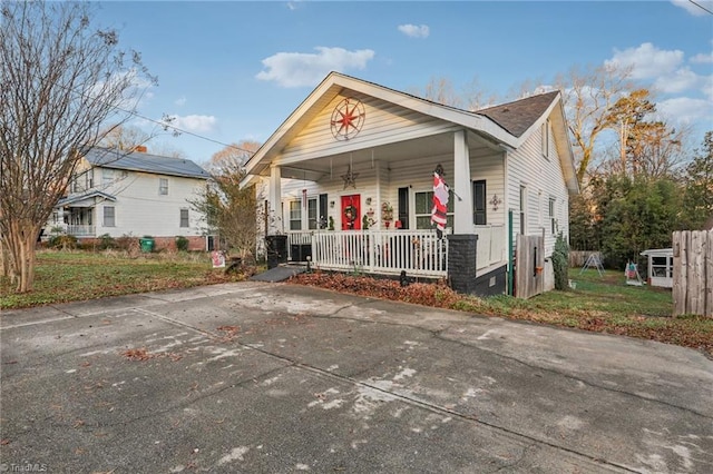 bungalow-style house featuring covered porch