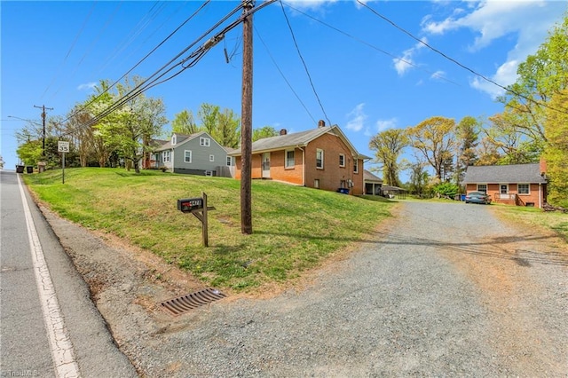 4478 Ogburn Ave, Winston-Salem, NC 27105 - view of front of house with driveway and a front yard