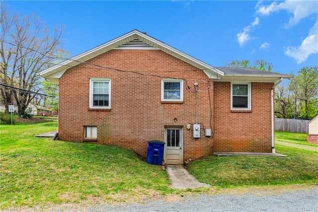 4478 Ogburn Ave, Winston-Salem, NC 27105 - view of side of property with a yard and brick siding